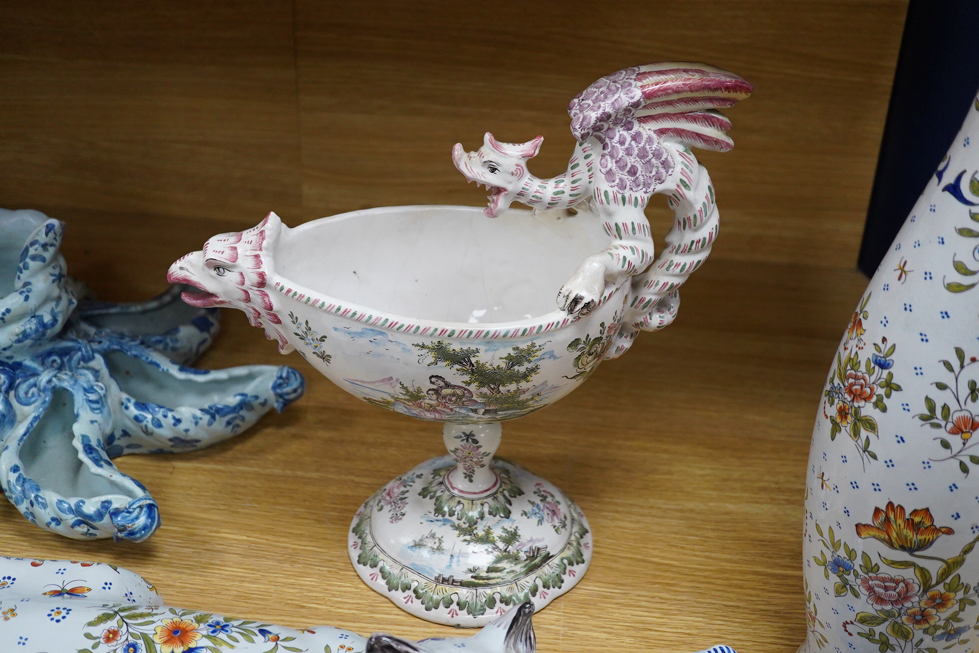 Five French faience pottery items, dating from the late 18th century to late 20th century. Tallest -vase 51cm high.